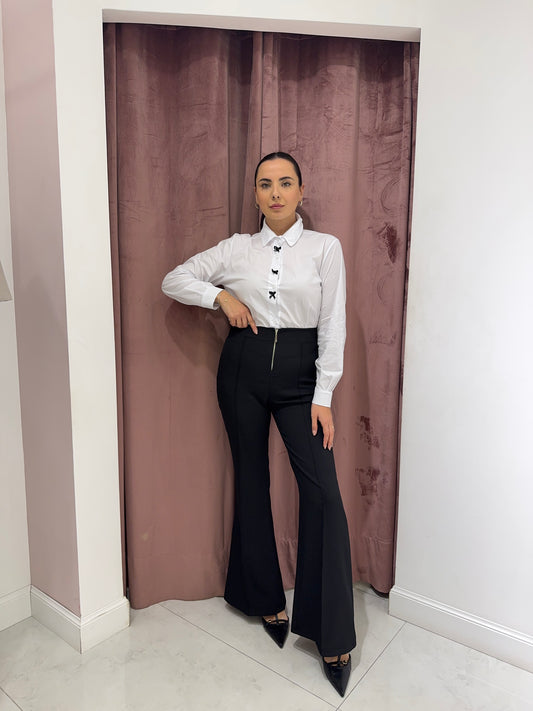 Pantalone a zampa con zip - Nero