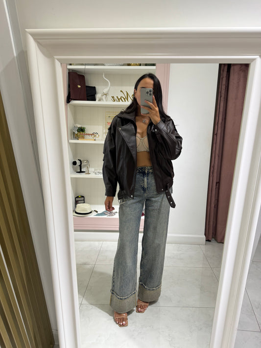 Jeans palazzo con piegone sabbiato